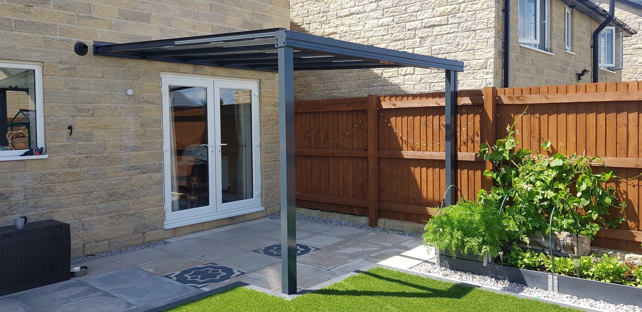 Simplicity 6 veranda fitted at a low pitch beneath a bungalow eaves line